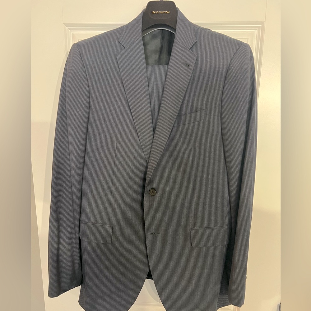 Louis Vuitton blue suite with accents